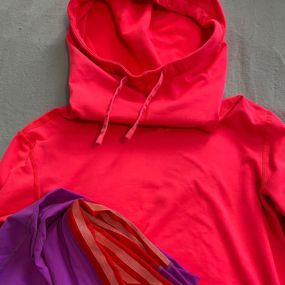 Orange Nike pull over hooded sweatshirt